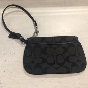 COACH monogramed wristlet
